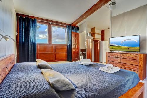 Postel nebo postele na pokoji v ubytování Vaste chambre vue mer montagne Ti Kaz Miyou 3