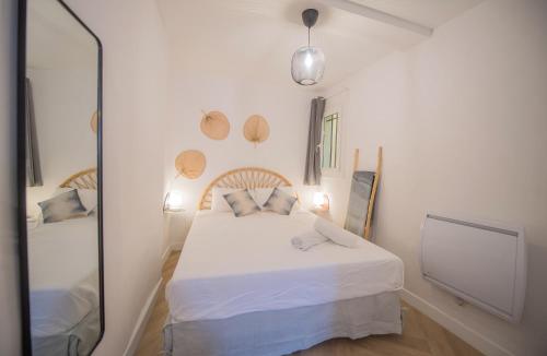 Ένα ή περισσότερα κρεβάτια σε δωμάτιο στο 4 couchages aux pieds des musées - WiFi