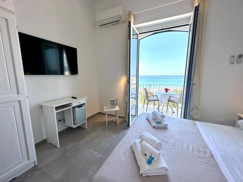 Postel nebo postele na pokoji v ubytování Hotel Marconi