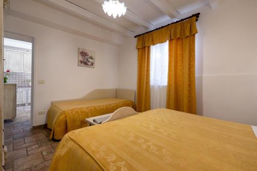 Ένα ή περισσότερα κρεβάτια σε δωμάτιο στο Agriturismo Salinola 4