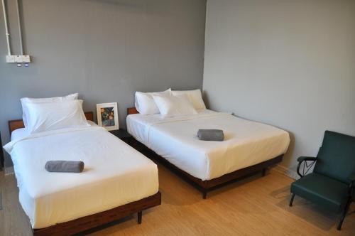 Katil atau katil-katil dalam bilik di GRAYHAUS INN Ipoh