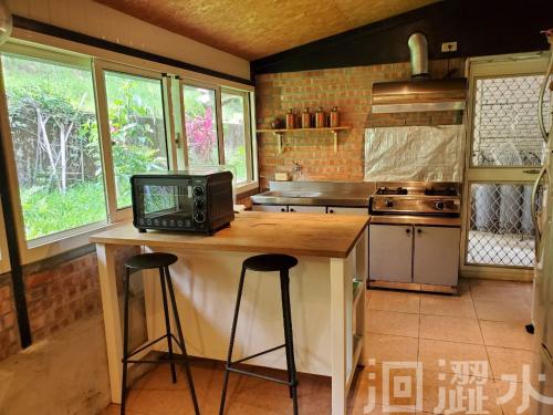 Una cocina o zona de cocina en 日月潭洄澀水包棟民宿