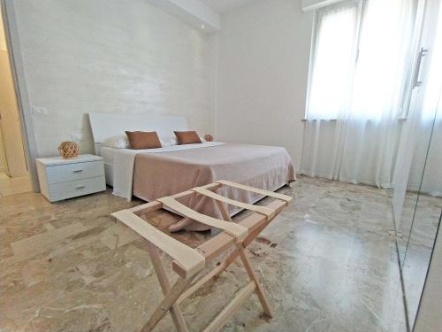 A bed or beds in a room at Casa Emmeti