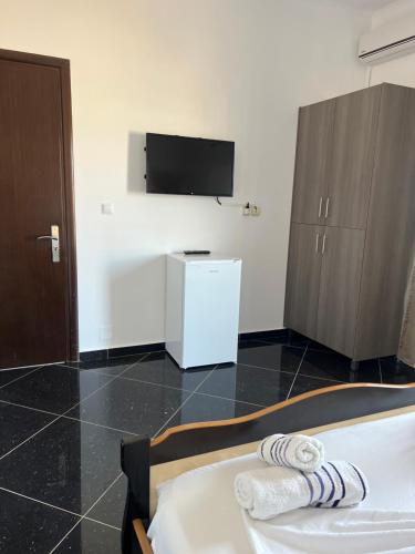 En TV eller et underholdningssystem på Vila Flavin 1