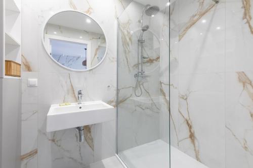 Ένα μπάνιο στο Seaside Apartamenty Bałtycka 22 Kołobrzeg, parking w cenie