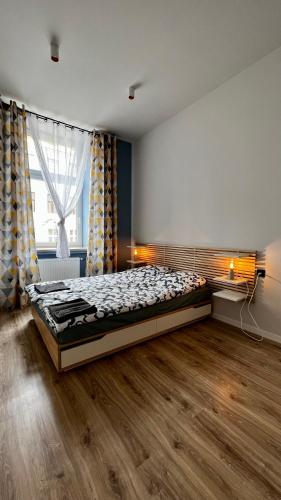 Кровать или кровати в номере Chill Apartment Żeromskiego