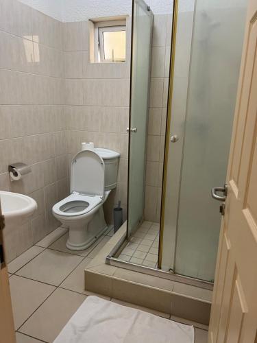 Kopalnica v nastanitvi Apartment Tamarinier Complexe