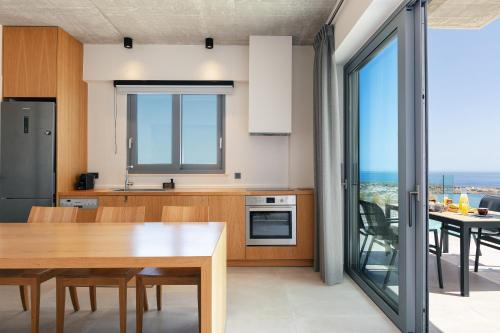 Η κουζίνα ή μικρή κουζίνα στο Krystallon Villas