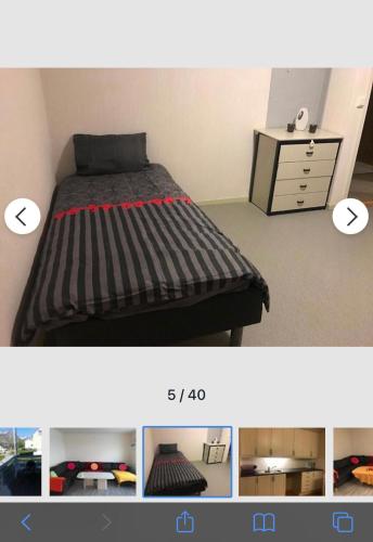 1 dormitorio con 1 cama y vestidor en Senja Villa, en Gryllefjord