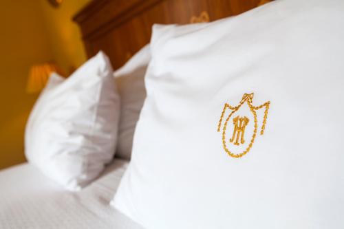 Кровать или кровати в номере Hotel Inglaterra