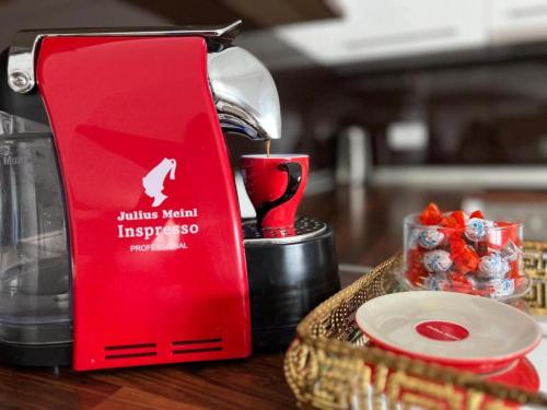 a red mixer sitting on top of a counter at Apartment HUMAC, Ljubuški in Ljubuški