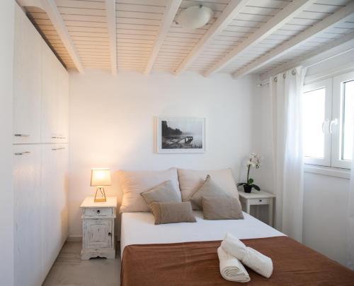 Postel nebo postele na pokoji v ubytování Sunny Villa Roselani
