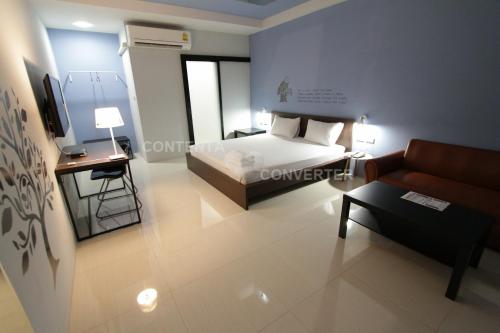 Katil atau katil-katil dalam bilik di Eazy Motel B.a.n.g.n.a