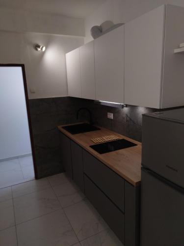Kuchyň nebo kuchyňský kout v ubytování Belleview Apartments Vrbica