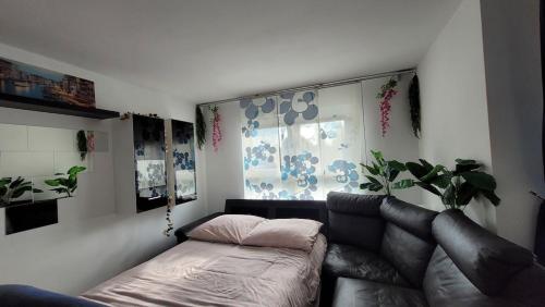 Katil atau katil-katil dalam bilik di Unique Munich Apartment