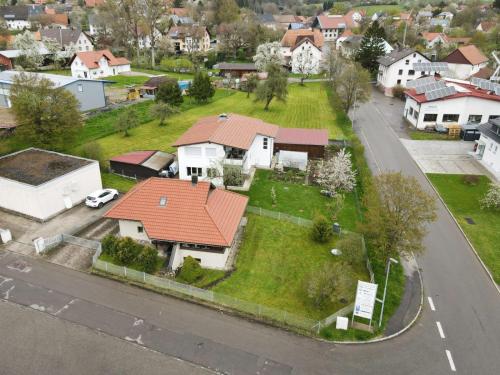 an aerial view of a house with a yard at Haus Uhlennest in Ühlingen-Birkendorf