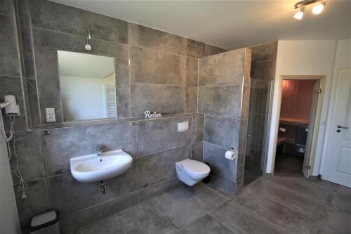 Koupelna v ubytování Fehmarnhaus 2