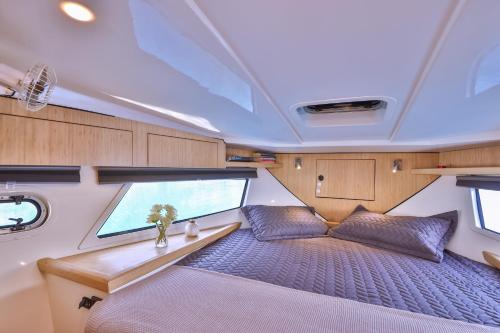 a view of a bedroom in a motor boat at Blue Neptune Yacht in Kaş
