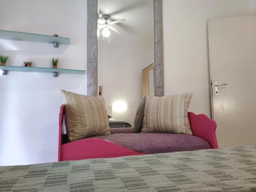 Ένα ή περισσότερα κρεβάτια σε δωμάτιο στο Apartments Helena