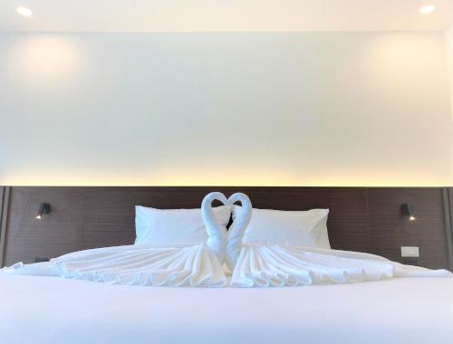 GEEN Hotel Chonburiにあるベッド