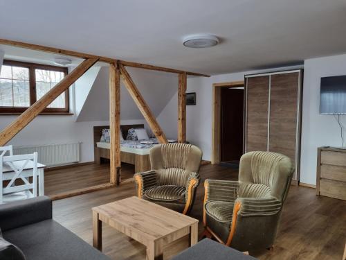 Posezení v ubytování Apartmány u Petra Jeseník