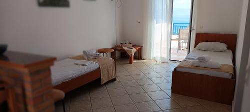 Cama o camas de una habitación en Prapas Apartments