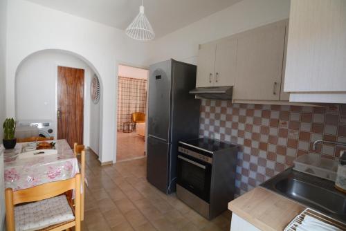 Kuchyň nebo kuchyňský kout v ubytování Stella's House Corfu
