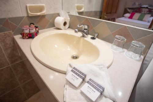 Ein Badezimmer in der Unterkunft Hotel Rosario La Paz