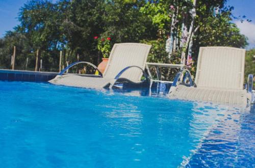Der Swimmingpool an oder in der Nähe von Recanto da Sossô