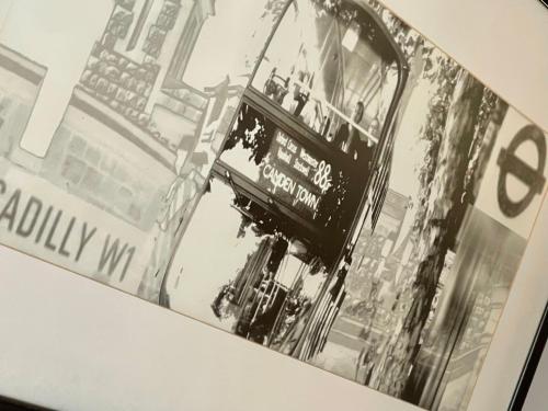 a black and white photo of a bus at The Crown London, WorldHotels Distinctive in London