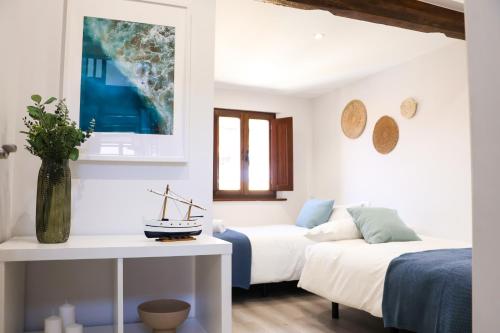 Postel nebo postele na pokoji v ubytování LAGO Home - Apartamento nuevo en Llanes centro