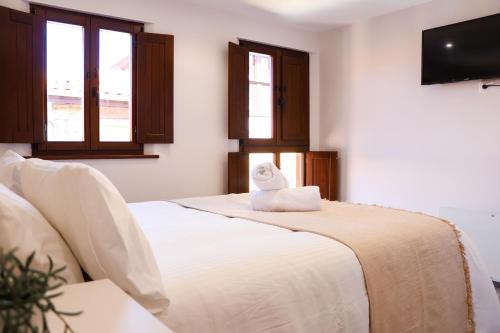Postel nebo postele na pokoji v ubytování LAGO Home - Apartamento nuevo en Llanes centro