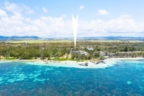 an aerial view of a small island in the ocean at Beach Penthouse BELMARE in Belle Mare