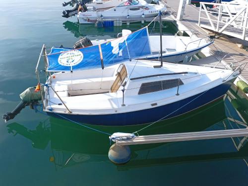 a boat is docked at a dock in the water at Lanza Boat in Arrecife