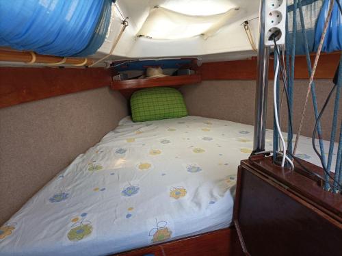 a small bed in the back of a boat at Lanza Boat in Arrecife