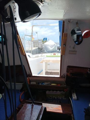 a view from the inside of a boat with a window at Lanza Boat in Arrecife