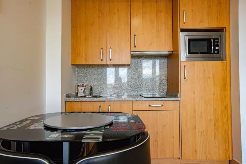 Kitchen o kitchenette sa Holidays, Miramar Ski, Estudio 4 personas & Parking