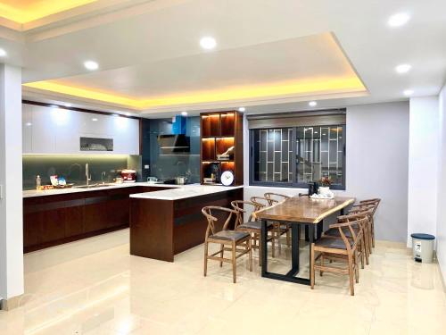 A kitchen or kitchenette at TaMaDu's House