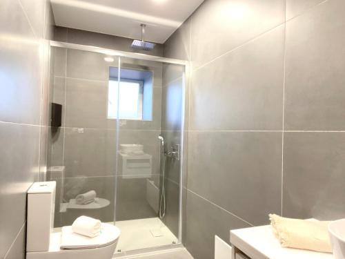 Ένα μπάνιο στο Cosy house in Nazaré with sea view