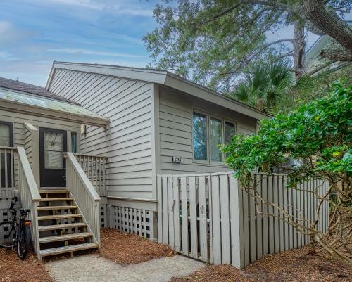 a small house with a staircase in front of it at 1248 Creekwatch Villa in Seabrook Island
