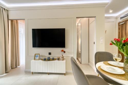 TV a/nebo společenská místnost v ubytování Apartments Ostsee Suntowers TARAS