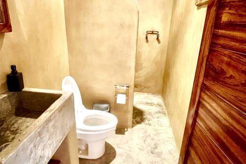 Et badeværelse på Casa Maloya alberca y vista al mar