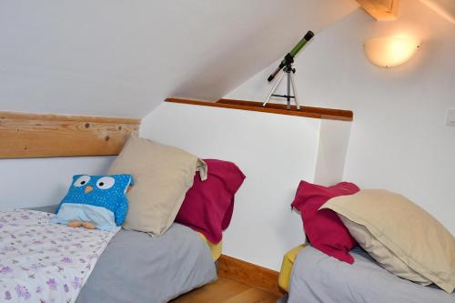 Postel nebo postele na pokoji v ubytování Appartement confortable au pied des pistes avec vue imprenable