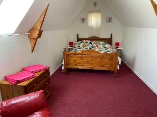 Postel nebo postele na pokoji v ubytování Rose Cottage