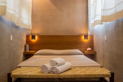 Una cama o camas en una habitación de Nectar Hotel, Cafe, Cowork - Adults Only