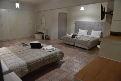 ZAKROS HOTELにあるベッド
