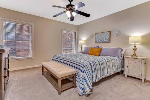 a bedroom with a bed and a ceiling fan at Med Center Duplex Pool Hot Tub 1 mi 2 NRG 2100 sf in Houston