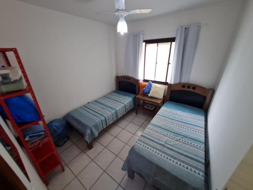 Katil atau katil-katil dalam bilik di Vista p Mar Apt. Centro Meaípe