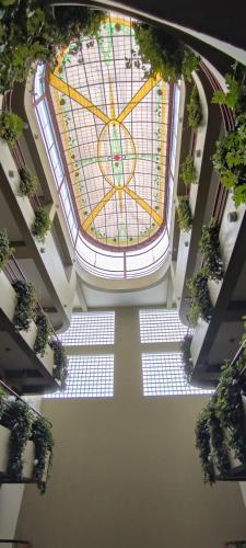 an overhead view of a building with a large window at Faraona Grand Hotel in Lima