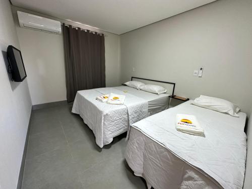 Postel nebo postele na pokoji v ubytování Hotel Fly - Aeroporto Cuiabá